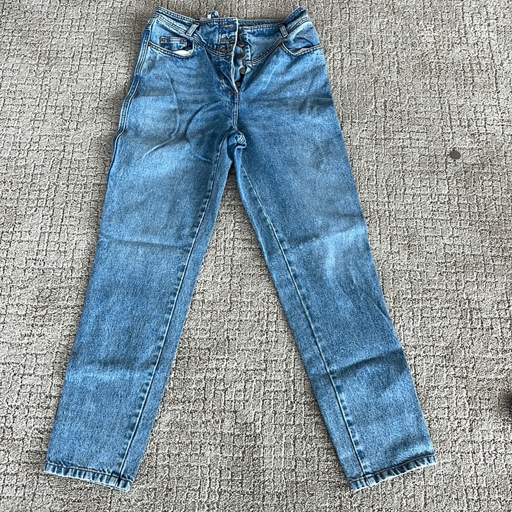 Rouje high rise light wash jeans.